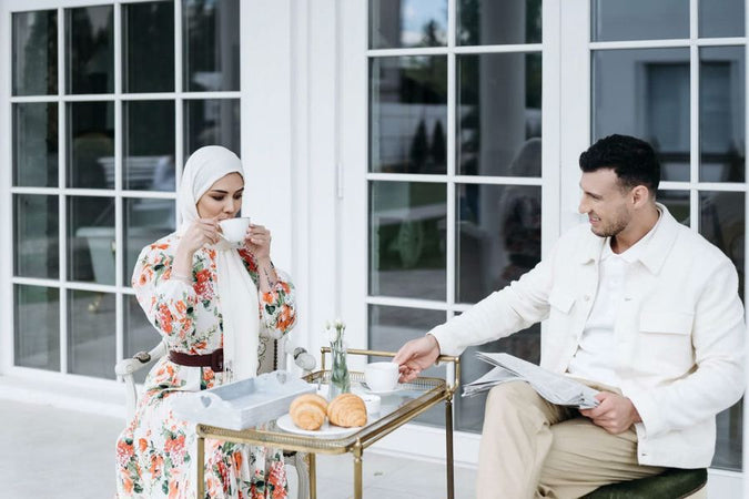 Muslim woman drinking her halal CBD coffee with a friend